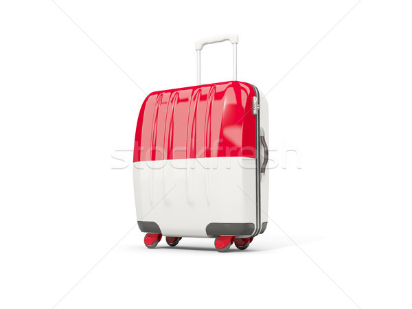 Luggage with flag of monaco. Suitcase isolated on white Stock photo © MikhailMishchenko