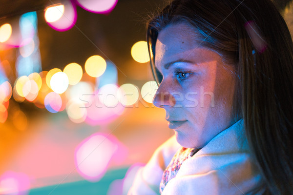 Beautiful young woman with city lights Stock photo © MikhailMishchenko