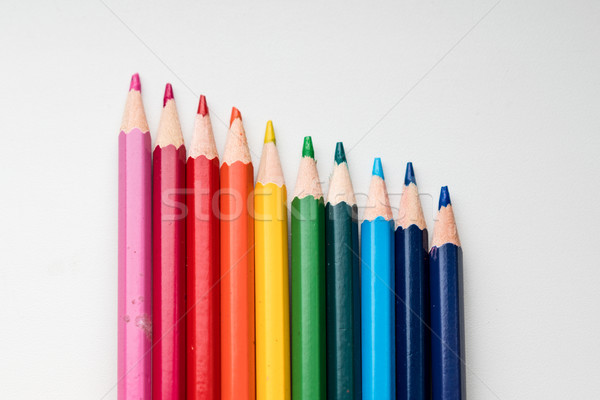 Szívárványszínű ceruzák közelkép izolált fehér toll Stock fotó © MikhailMishchenko