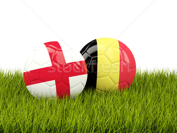 England vs Belgium. Soccer concept. Footballs with flags on gree Stock photo © MikhailMishchenko
