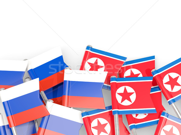 Flag pins of Russia and North Korea isolated on white Stock photo © MikhailMishchenko