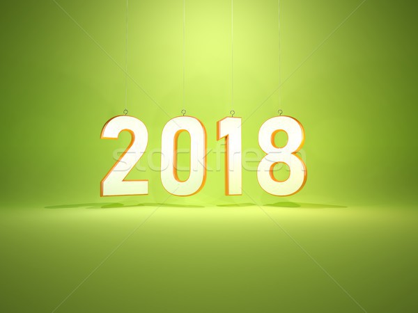 2018 New Year symbol over green background Stock photo © MikhailMishchenko