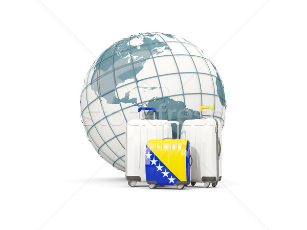 Luggage with flag of bosnia and herzegovina. Three bags in front Stock photo © MikhailMishchenko