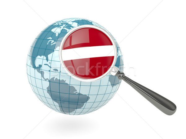 Magnified flag of latvia with blue globe Stock photo © MikhailMishchenko