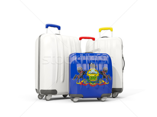 Luggage with flag of pennsylvania. Three bags with united states Stock photo © MikhailMishchenko