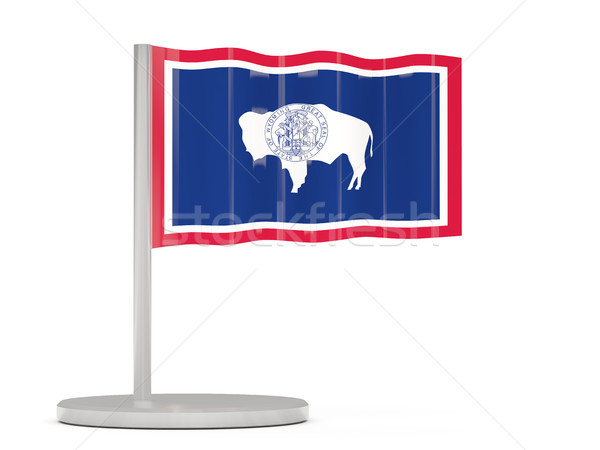 Flag pin with flag of wyoming. United states local flags Stock photo © MikhailMishchenko