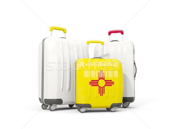 Luggage with flag of new mexico. Three bags with united states l Stock photo © MikhailMishchenko