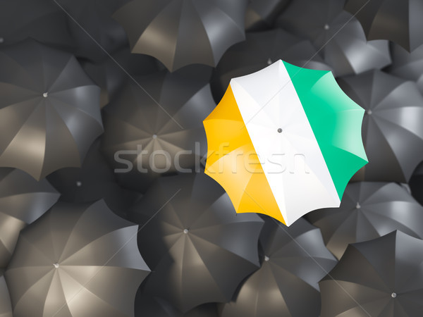 Umbrella with flag of cote d'Ivoire Stock photo © MikhailMishchenko