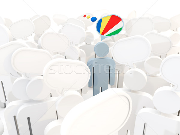 Man with flag of seychelles in a crowd Stock photo © MikhailMishchenko