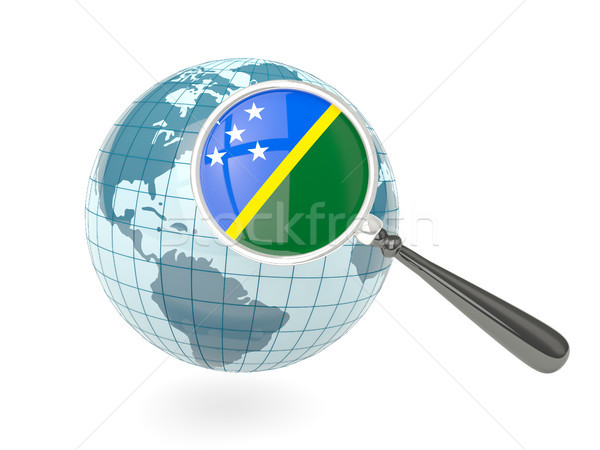 Magnified flag of solomon islands with blue globe Stock photo © MikhailMishchenko