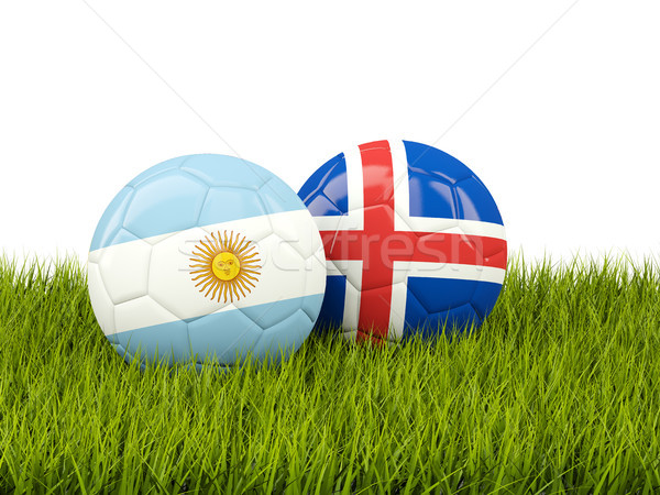 Argentina vs Iceland. Soccer concept. Footballs with flags on gr Stock photo © MikhailMishchenko