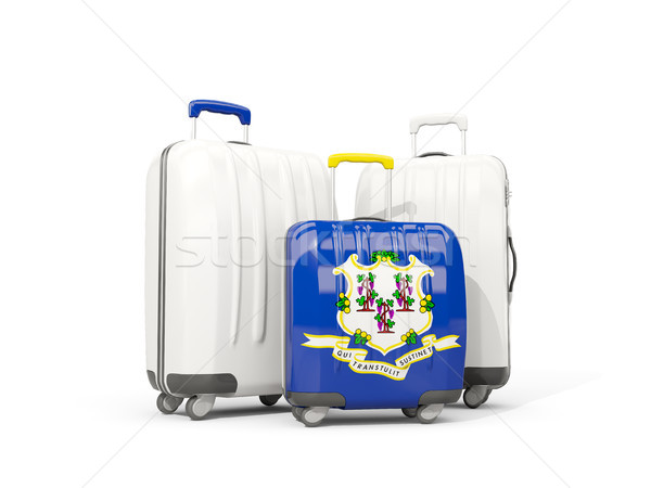 Luggage with flag of connecticut. Three bags with united states  Stock photo © MikhailMishchenko
