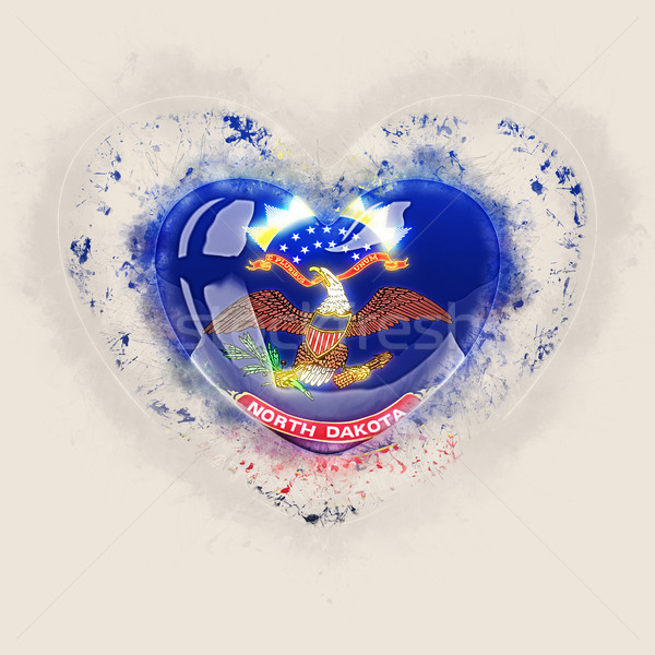 north dakota state flag on a grunge heart. United states local f Stock photo © MikhailMishchenko