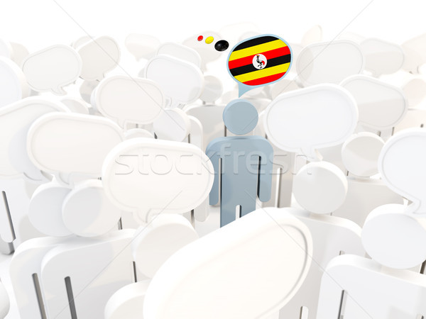 Man with flag of uganda in a crowd Stock photo © MikhailMishchenko