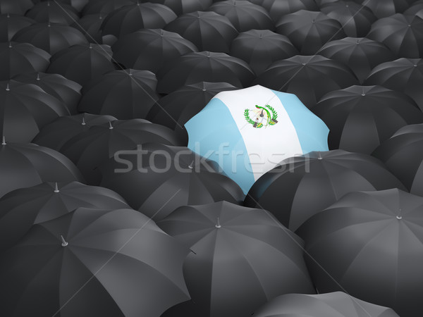 Umbrella with flag of guatemala Stock photo © MikhailMishchenko