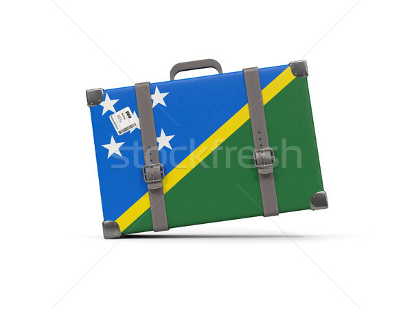 Luggage with flag of solomon islands. Suitcase isolated on white Stock photo © MikhailMishchenko