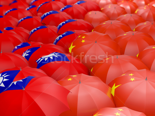 Flags of China and Taiwan on umbrellas Stock photo © MikhailMishchenko