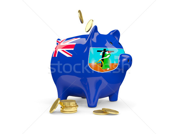 Stock photo: Fat piggy bank with fag of montserrat