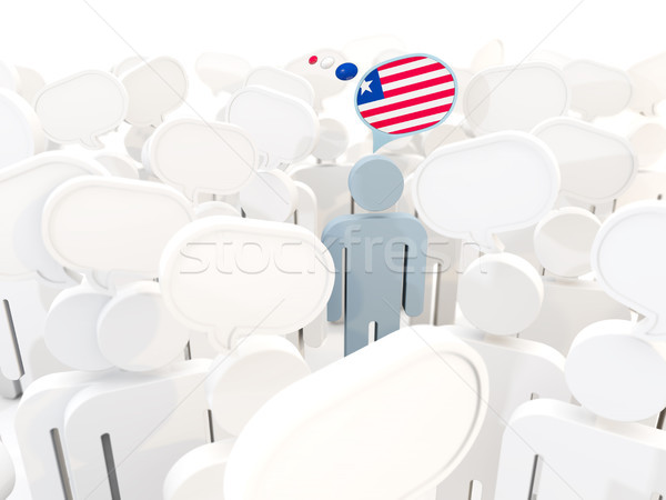 Man with flag of liberia in a crowd Stock photo © MikhailMishchenko