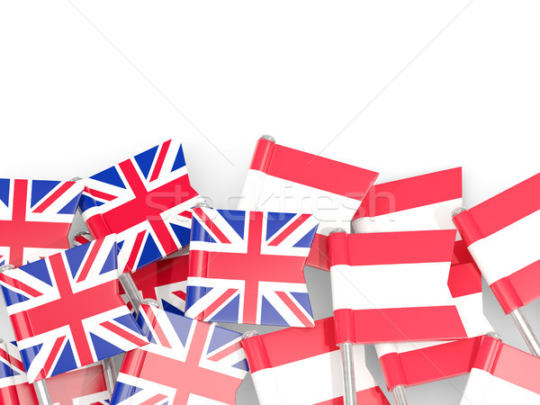 Stock photo: Flag pins of United Kingdom and Austria isolated on white