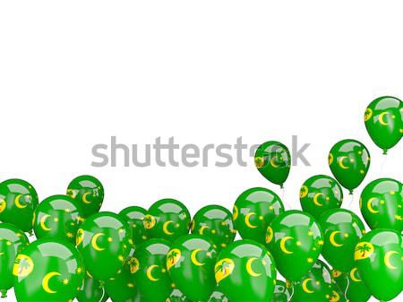 Flying balloons with flag of cocos islands Stock photo © MikhailMishchenko
