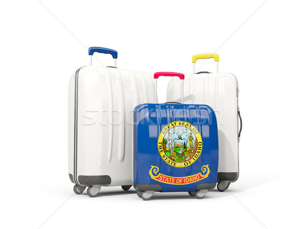Luggage with flag of idaho. Three bags with united states local  Stock photo © MikhailMishchenko