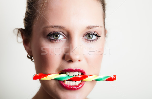 年輕女子 糖果 牙齒 女孩 商業照片 © MikLav