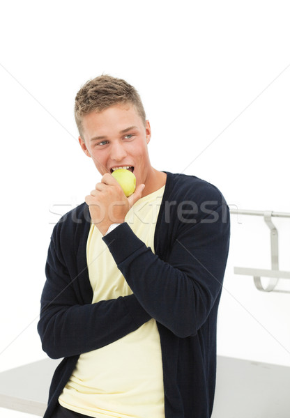 Jonge man appel knap blond man eten Stockfoto © MikLav