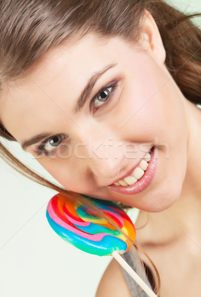 Stock photo: Teenager girl with lollipop