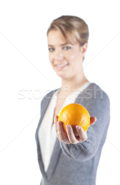 Mooie meisje oranje hand geïsoleerd witte Stockfoto © MikLav