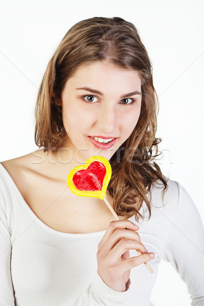 商業照片: 青少年 · 女孩 · 棒糖 · 肖像 · 微笑