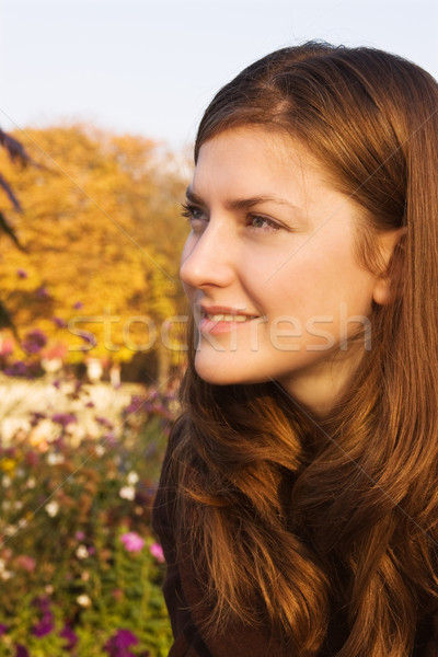 Young woman in a bright autumn park Stock photo © MikLav