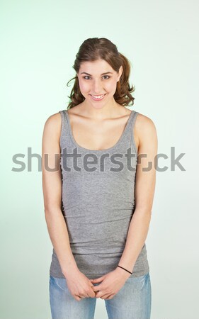 Szerény lány mosolyog tinédzser késő tinédzserek Stock fotó © MikLav
