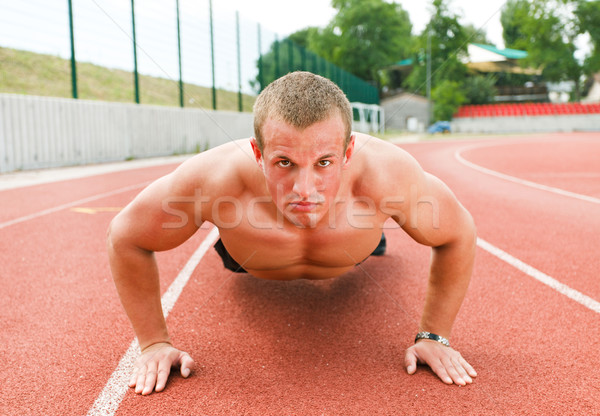 молодые мышечный человека Легкая атлетика трек Сток-фото © MilanMarkovic78