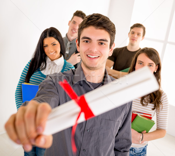 Foto stock: Bem · sucedido · masculino · estudante · belo · sorridente · diploma