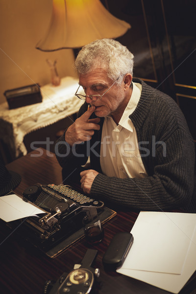 Stock photo: Worried Retro Senior Man Writer