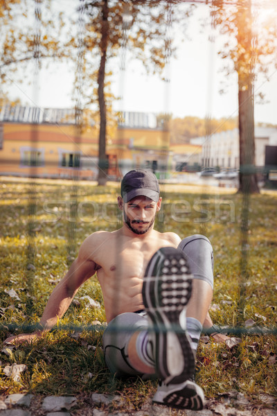 Young Man Exercising In Nature Stock photo © MilanMarkovic78