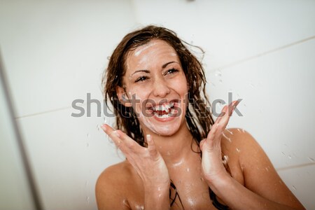 Fille lavage visage belle jeunes femme souriante [[stock_photo]] © MilanMarkovic78