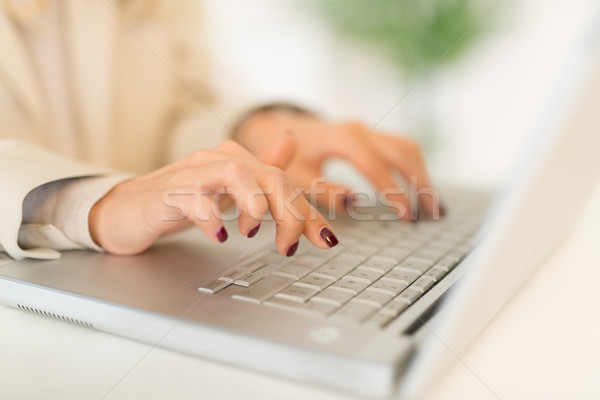 Businesswoman Working On Laptop Stock photo © MilanMarkovic78