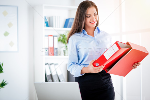 Pretty Businesswoman With Binder Stock photo © MilanMarkovic78