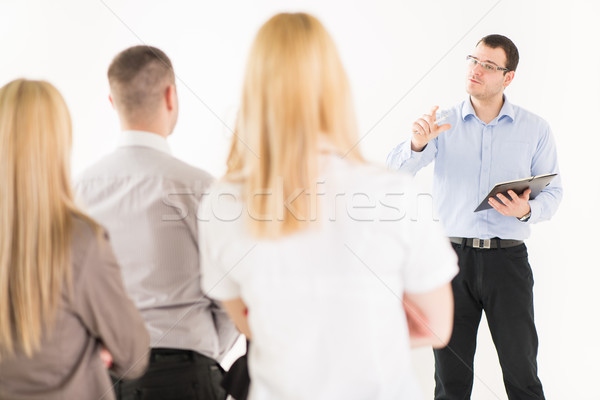 Happy Businessman Demonstrating his Project Stock photo © MilanMarkovic78