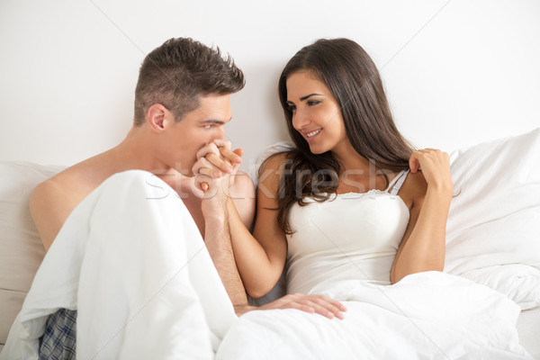 Köszönet szép este fiatal heteroszexuális pár ágy Stock fotó © MilanMarkovic78