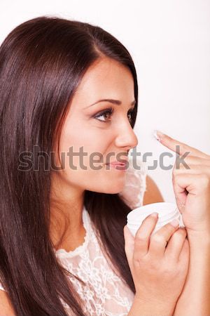 Young Woman Applied Face Cream Stock photo © MilanMarkovic78