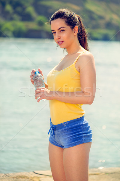 Erfrischung Ausübung schönen halten Wasserflasche Stock foto © MilanMarkovic78
