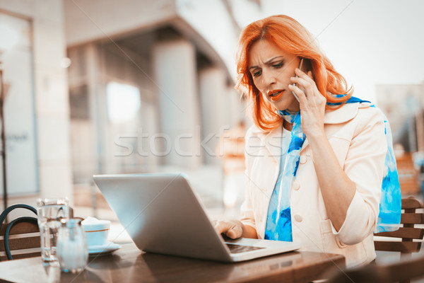 Businesswoman Working On A Coffee Break Stock photo © MilanMarkovic78