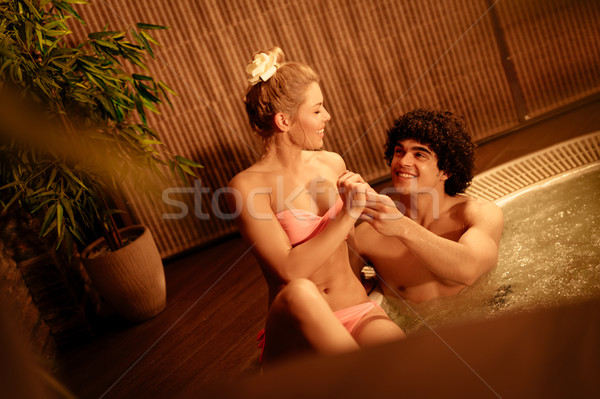 Coppia rilassante jacuzzi bella Foto d'archivio © MilanMarkovic78