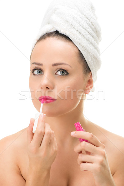 Kadın dudak parlatıcısı güzel genç kadın gül bakıyor Stok fotoğraf © MilanMarkovic78