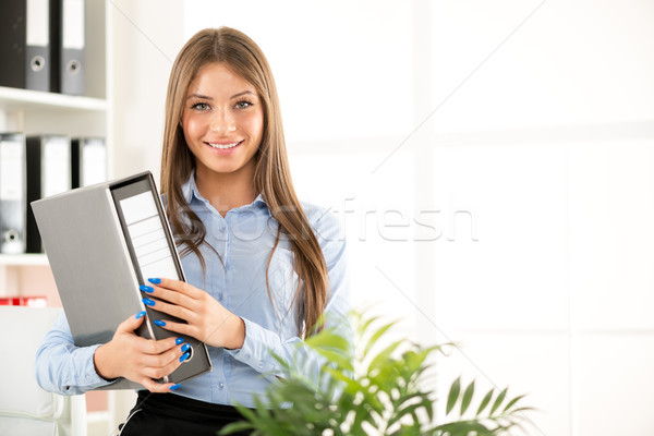 Young Businesswoman With Binder Stock photo © MilanMarkovic78