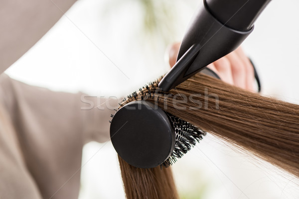 Cabelo cabelo castanho secador de cabelo mulher close-up Foto stock © MilanMarkovic78