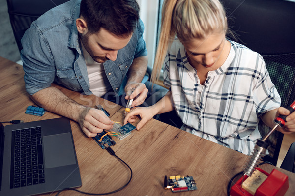 Engineers Working On Circuit Board Stock photo © MilanMarkovic78